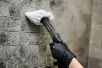 lechada de ducha limpia con vapor